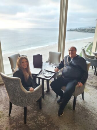 Michel Phillips and Wife Terry eating dinner at the beach